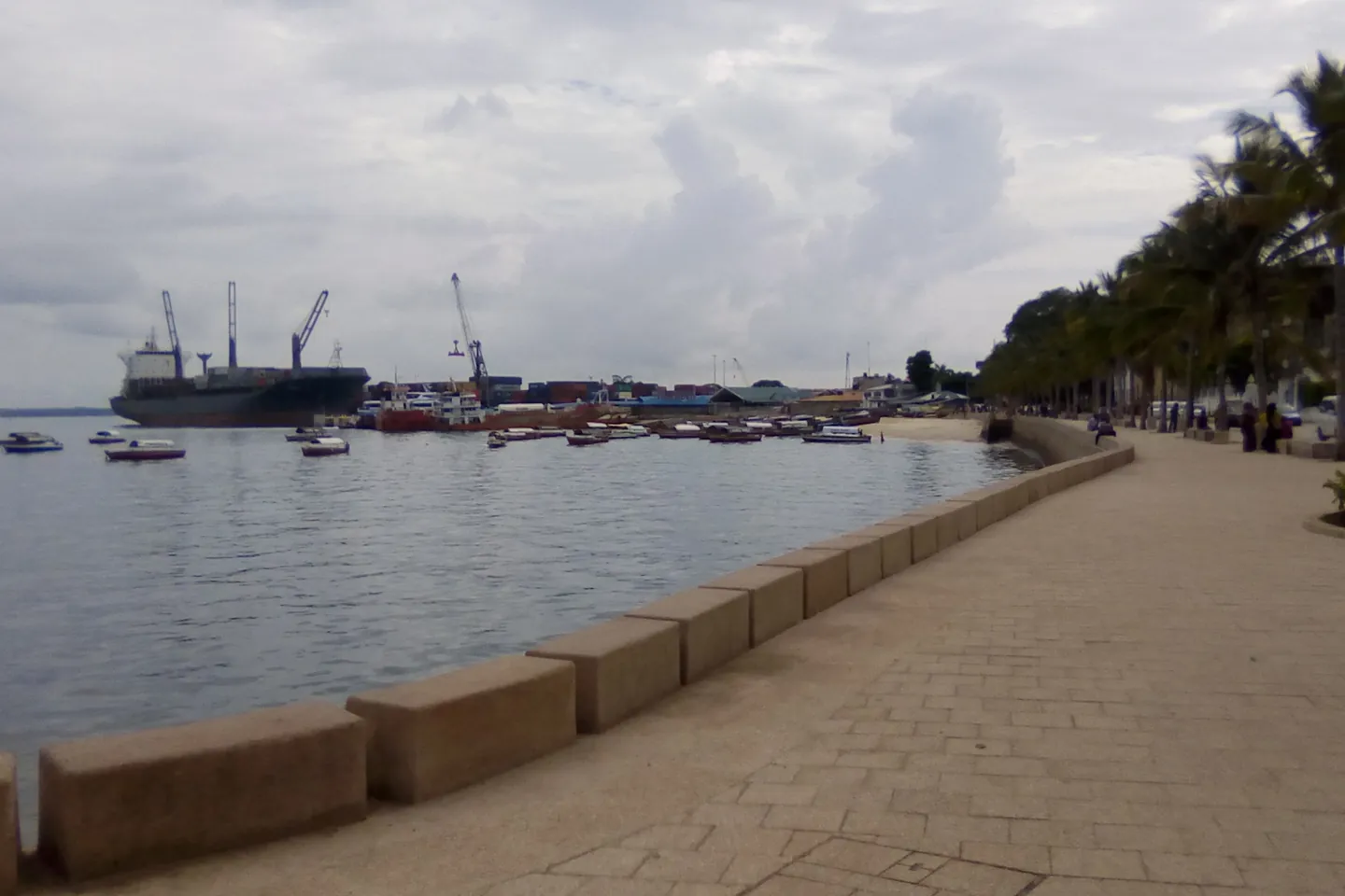 The Forodhani waterfront promenade in Stone Town, Zanzibar, with the harbour behind.